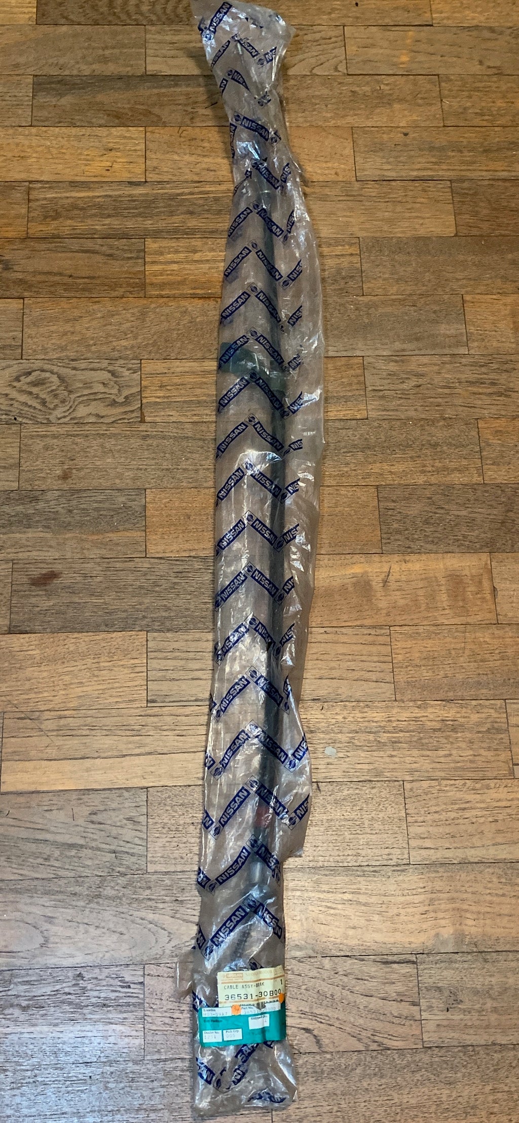 NOS Nissan LH handbrake cable for K10 Micra/March 88-92