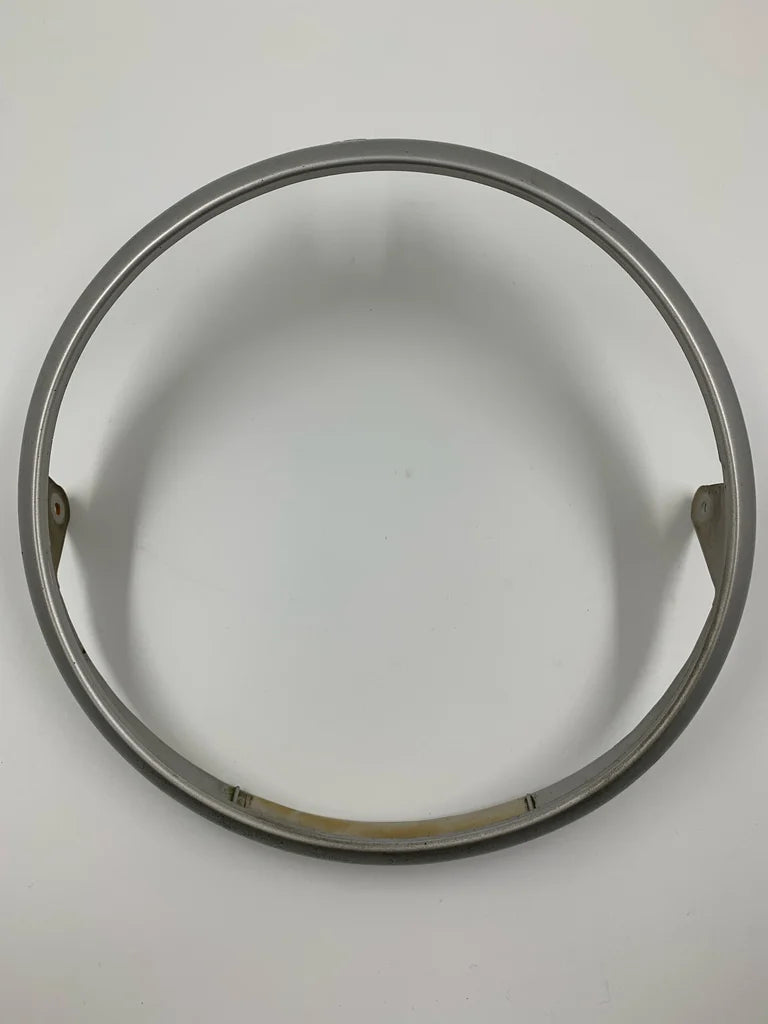Nissan Pao 'left' headlight plastic bezel, used