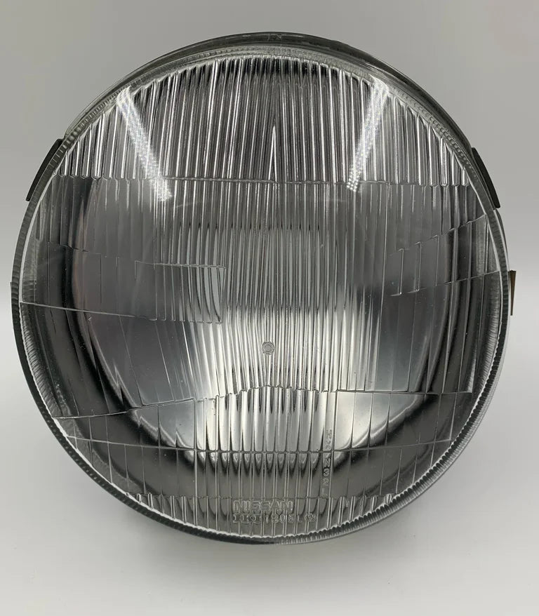 Used Nissan 'left' headlight for Nissan Pao.