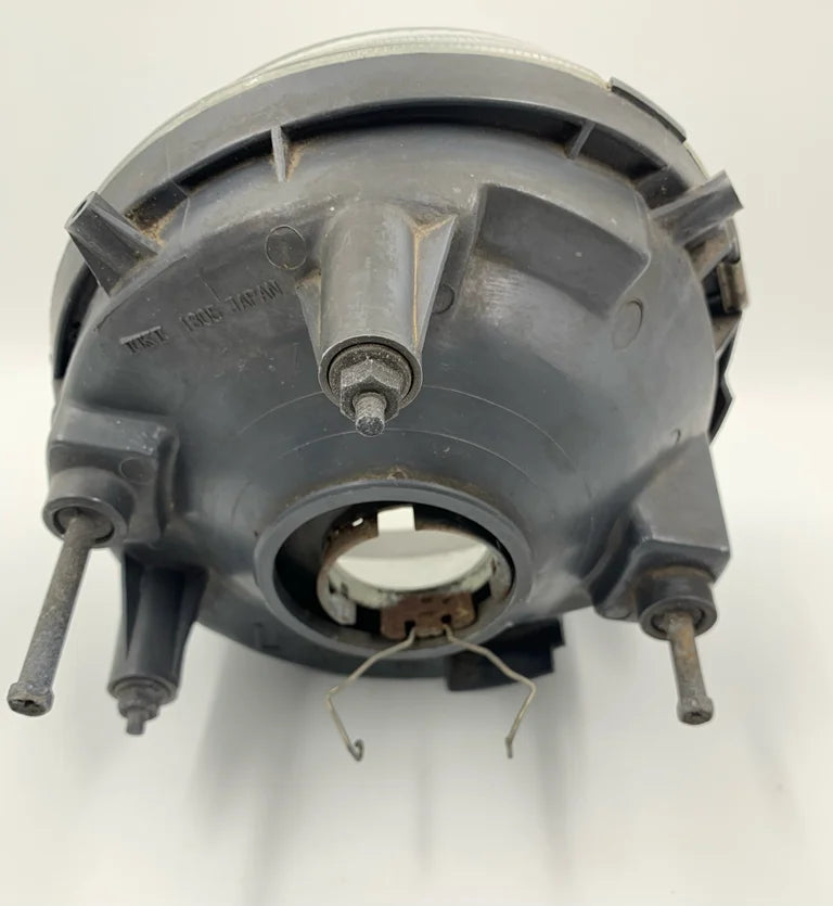 Used Nissan 'left' headlight for Nissan Pao.