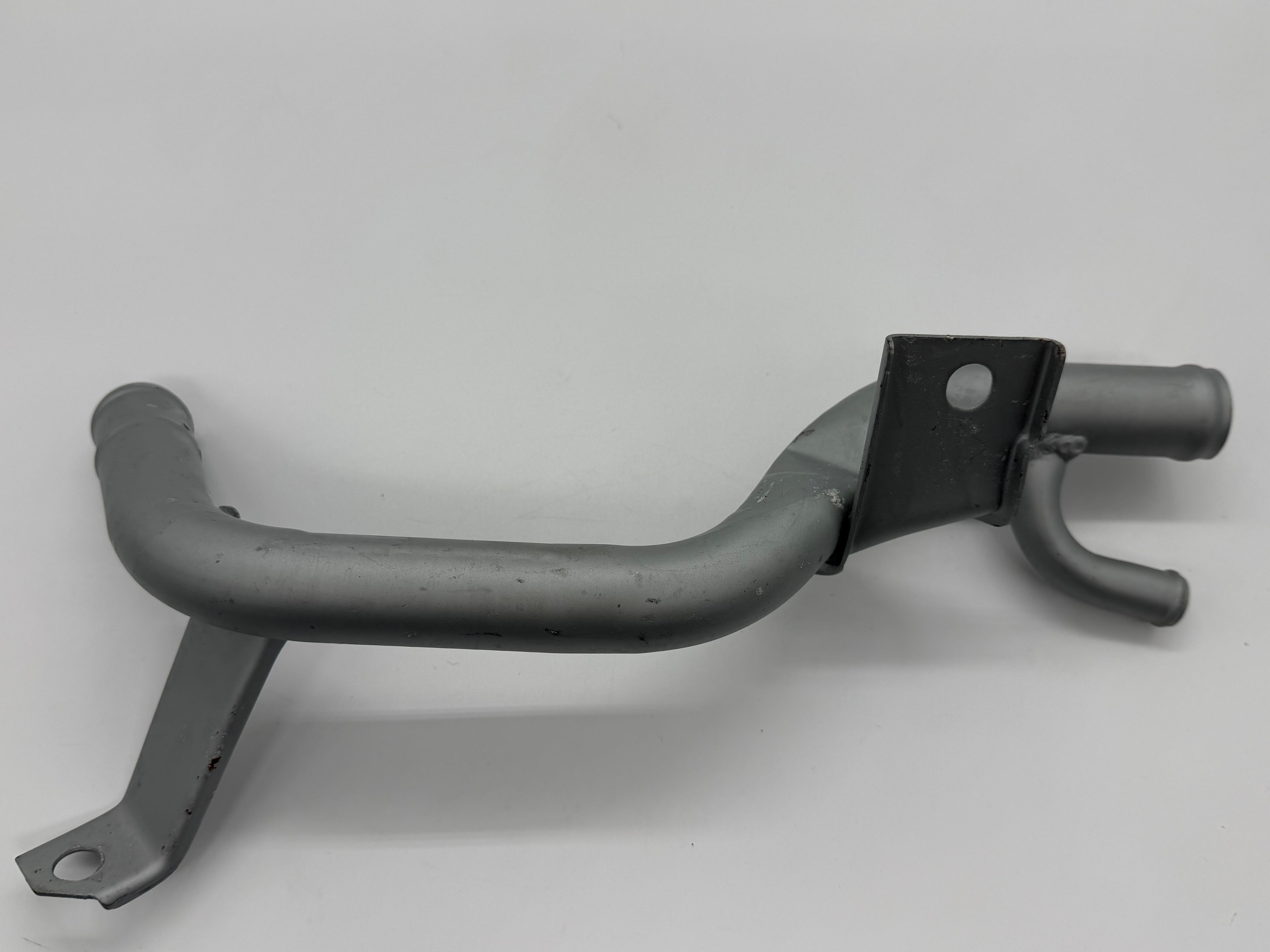 NOS New Nissan coolant pipe for S-Cargo