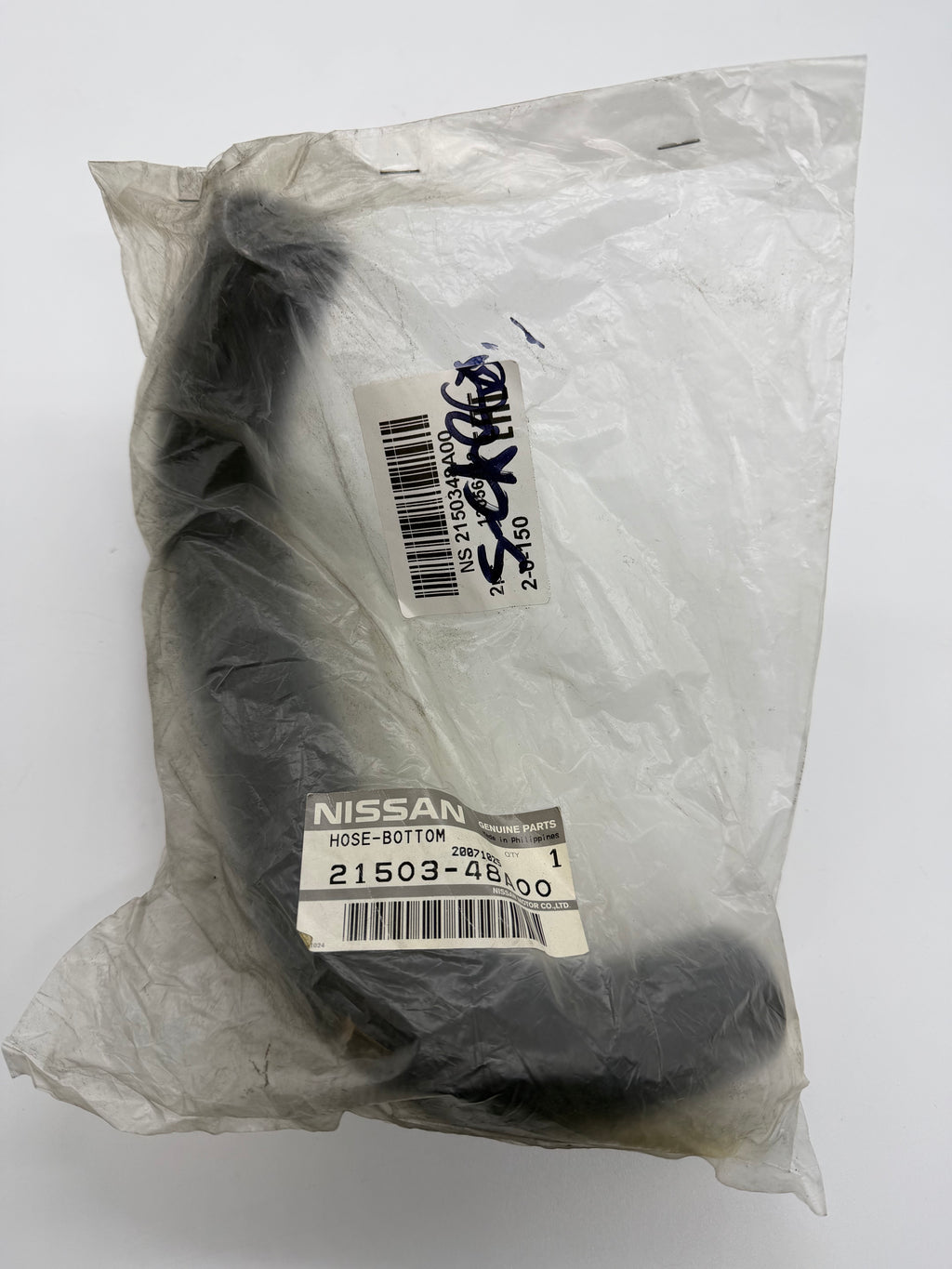 NOS New Nissan bottom radiator hose for S-Cargo, now obsolete