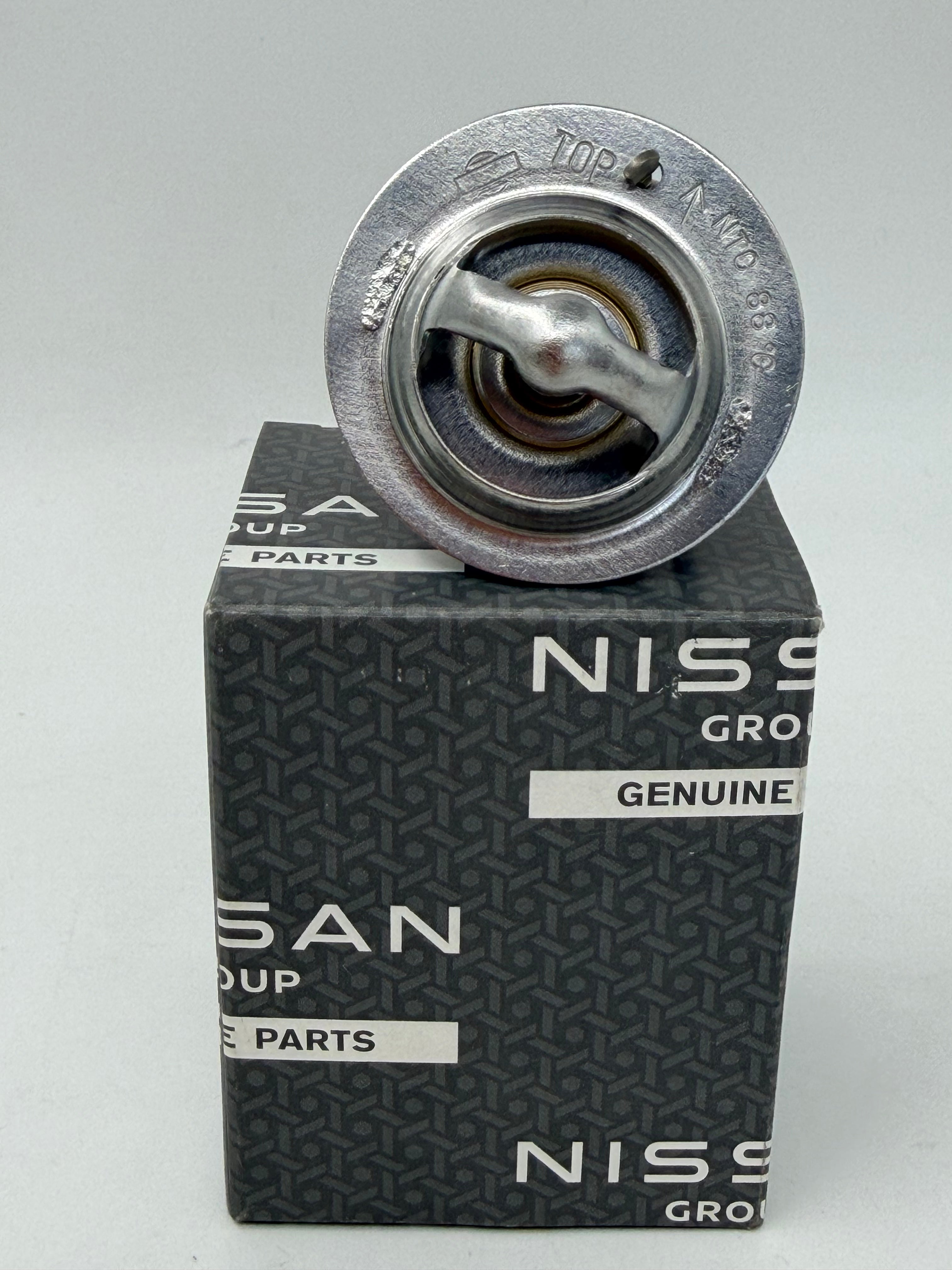 New genuine Nissan thermostat for Pao, K10 Micra and Be-1 - 88C