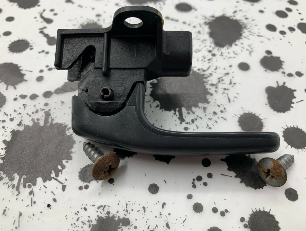 Black door handle for ivory Nissan Pao, used