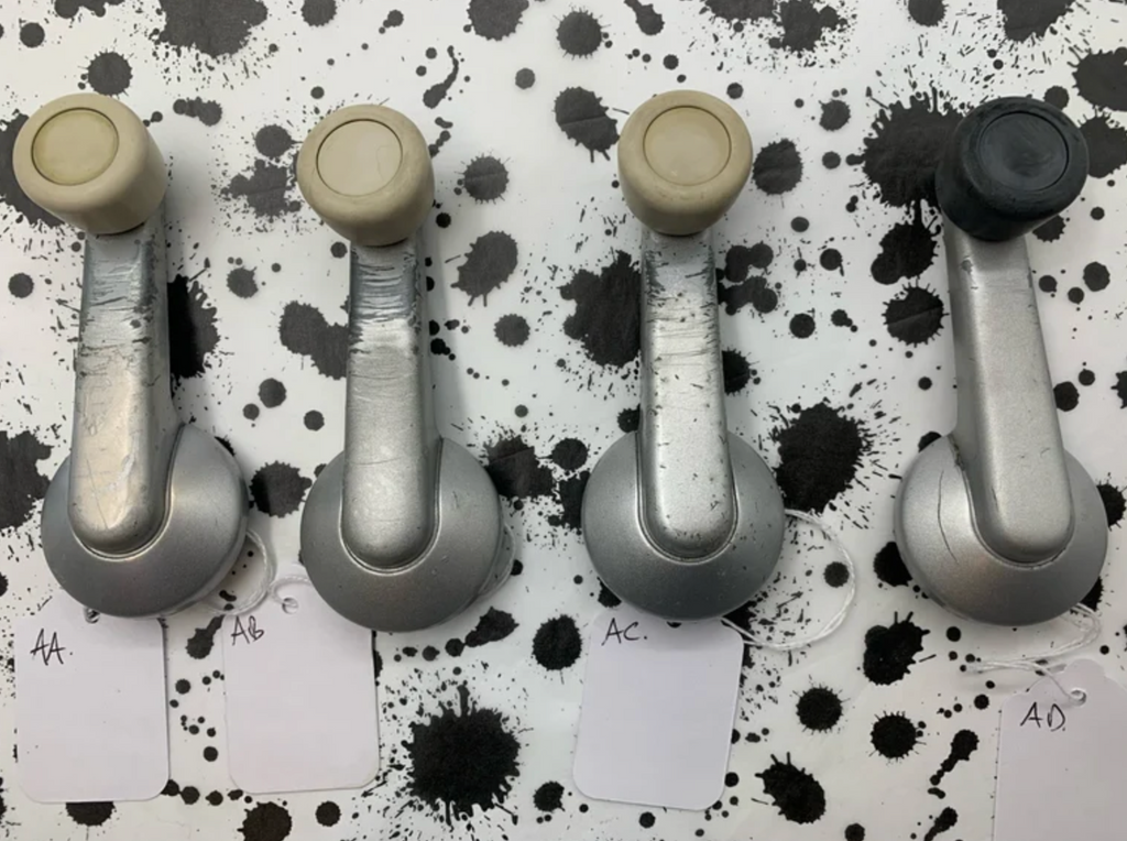 Nissan Pao window winder, ivory and black, used