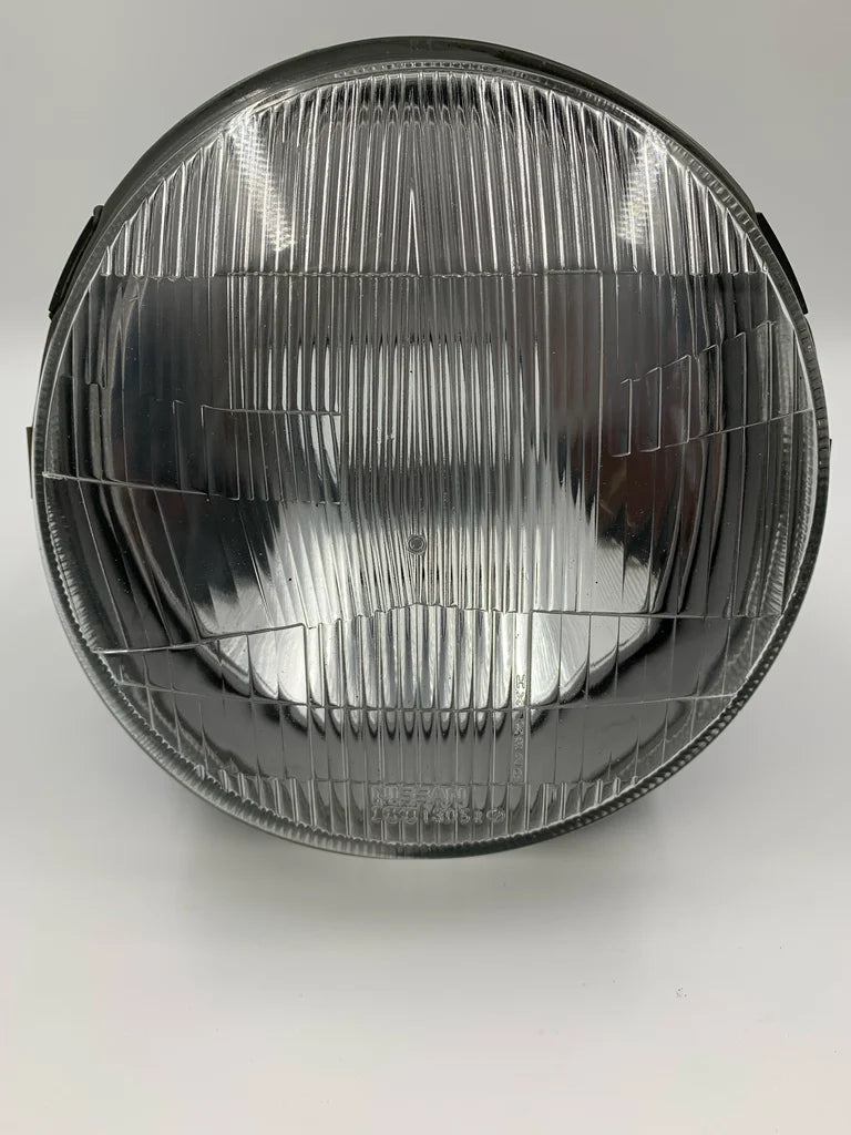 Used Nissan Pao 'right' headlight. R